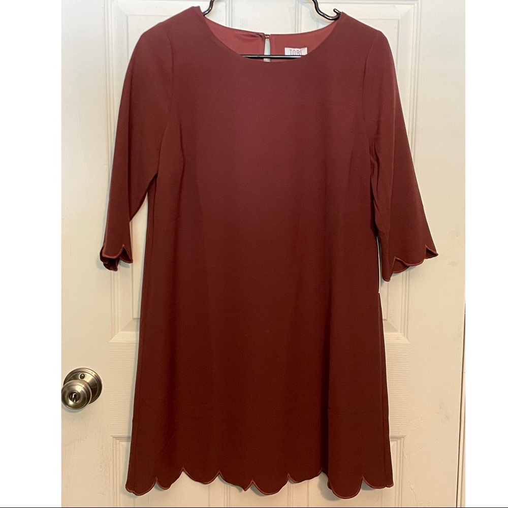 Dress by Tobi, size medium. Color is wine